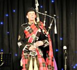 Traditional bagpiper 800p