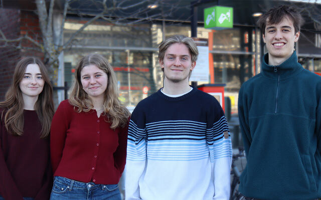 Picture of Orphee Goossens, Maïté De Visscher, Pieter-Jan Brysse and William Decoster outside the NIOM headquarter