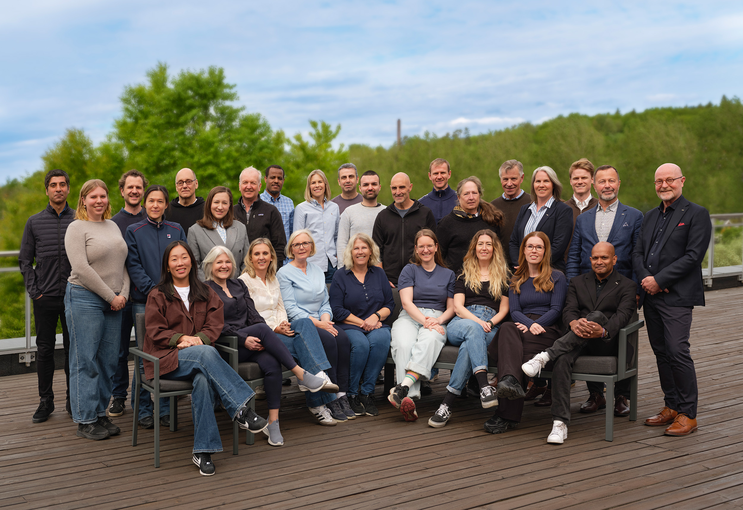 Group photo of the NIOM staff on the roof top